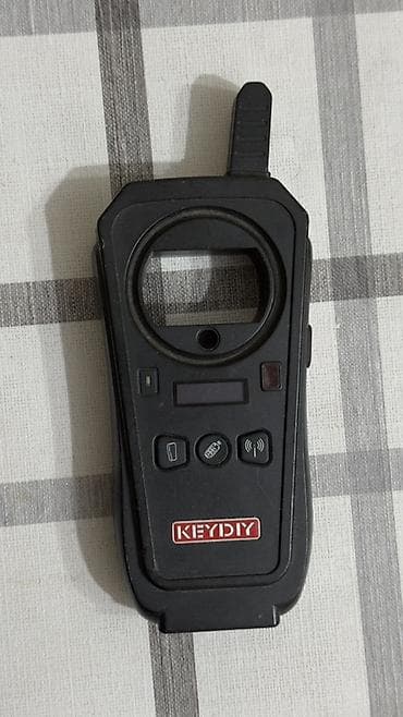 программатор для ключей: KEYDIY KD-X2 — универсальный программатор и копир автоключей/брелоков — 1