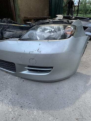 двухскатный спринтер: Mazda — 2