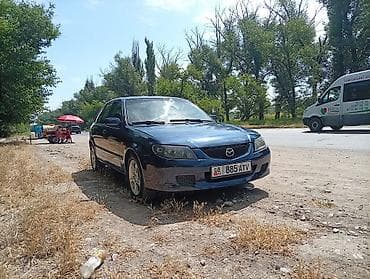 rd 1: Mazda 323: 2003 г., 1.6 л, Механика, Бензин, Универсал — 5