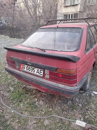 mitsubishi eclipse: Mazda 2: 1986 г., 0.2 л, Механика, Бензин, Хэтчбэк — 2