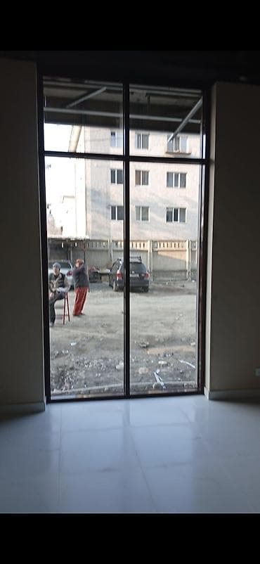 Г.Манас ул.Токтогула23.50м2.Панорамное остекление и входная группа для