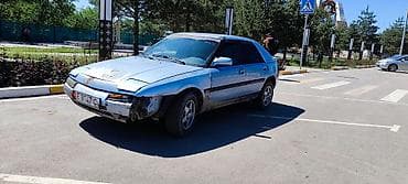 е 211: Mazda 323: 1994 г., 1.6 л, Ручные, Бензин, Хэтчбэк — 8