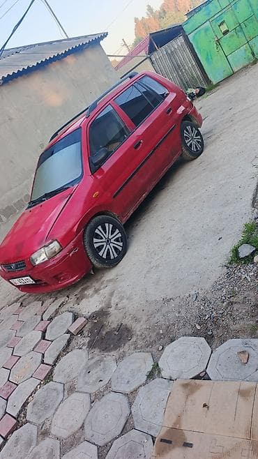 mazda 3: Mazda Demio: 1998 г., 1.3 л, Механика, Бензин, Хэтчбэк — 6