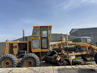 Автогрейдер Caterpillar (CAT) - Классическая 6х4 колесная схема