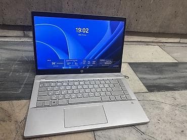 HP Pavilion 14 — тонкий серебристый ноутбук с экраном 14" и узкими