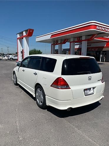 реалии: Honda Odyssey: 2006 г., 2.4 л, Автомат, Газ, Минивэн — 7