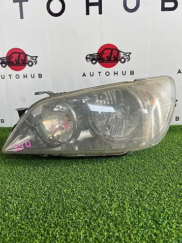 Передняя левая фара Toyota 2003 г., Оригинал