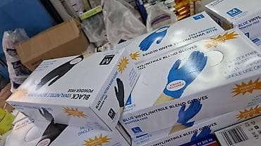 Одноразовые перчатки из нитрила и винил-нитрилового бленда -