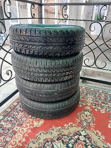 Шины: Комплект летних шин (4 шт.) - Размер: 185/70 R14 - Индекс — 2