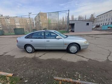 на мазда 626: Mazda Cronos: 1995 г., 2 л, Механика, Бензин, Седан — 8