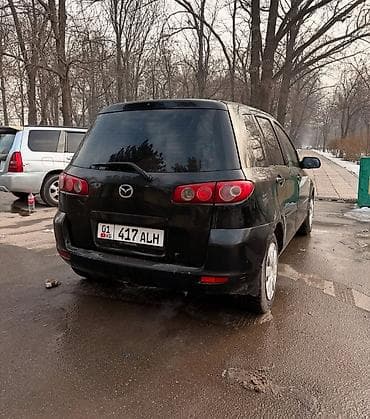 мазда каризма: Mazda Demio: 2003 г., 1.3 л, Автомат, Бензин, Хэтчбэк — 4