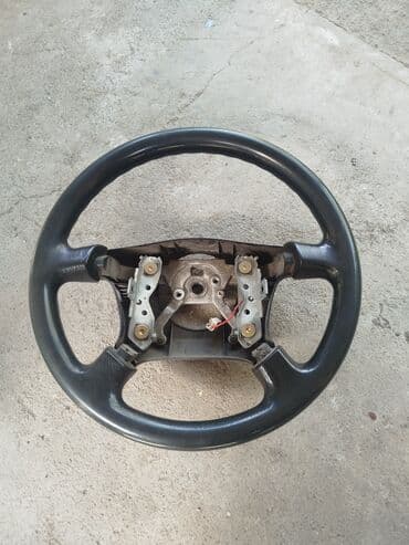 швейная машина для шитья кожи: Руль Mazda 2000 г. — 1