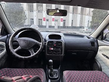 мицубиси спес стар: Mitsubishi Carisma: 2002 г., Седан — 5