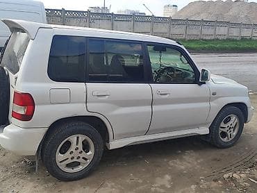 Mitsubishi Pajero iO: 2003 г., 2 л, Автомат, Бензин, Внедорожник — 2