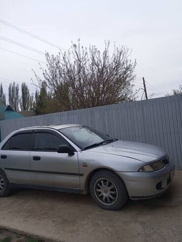 антены на машину: Mitsubishi Carisma: 1997 г., 1.8 л, Автоматтык, Бензин, Седан — 1