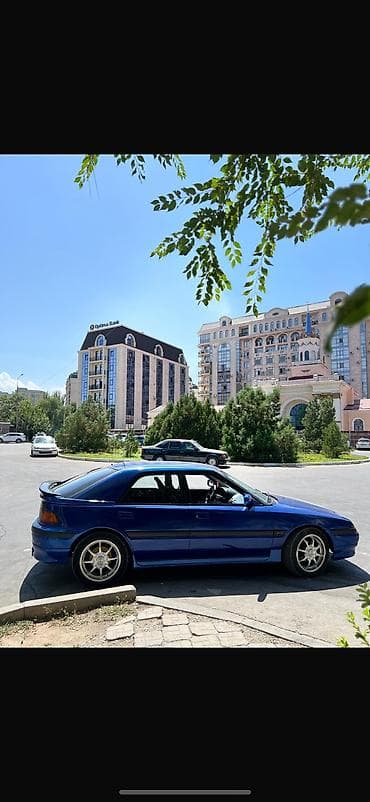 colf 2: Mazda Familia: 1992 г., Бензин, Хэтчбэк — 4