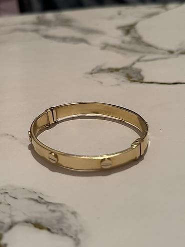 мужской золотой браслет: Браслет Картиэр 
Жёлтый золото 585
За грамм 8400сом
Срочно продам — 1