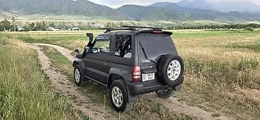 люки крыши ремонт: Mitsubishi Pajero Junior: 1995 г., 1.1 л, Автомат, Бензин, Внедорожник — 4