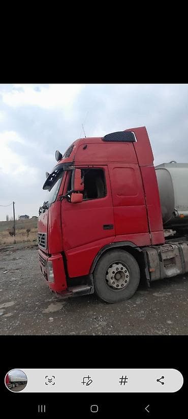 домики на колесах: Тягач, Volvo, 2002 г., Цистерна — 1