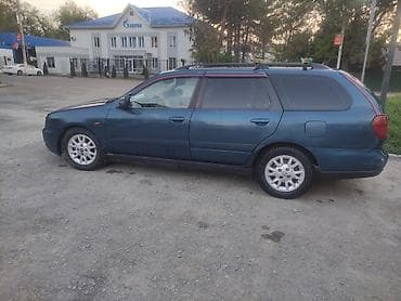 Nissan Primera: 1999 г., 1.8 л, Ручные, Бензин, Универсал — 9