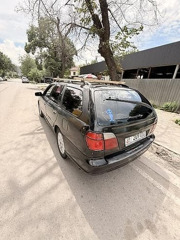 Транспорт: Nissan Primera: 2001 г., Механика, Бензин, Универсал — 4