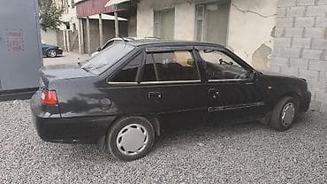 byd e5: Daewoo Nexia: 2009 г., Механика, Седан — 5