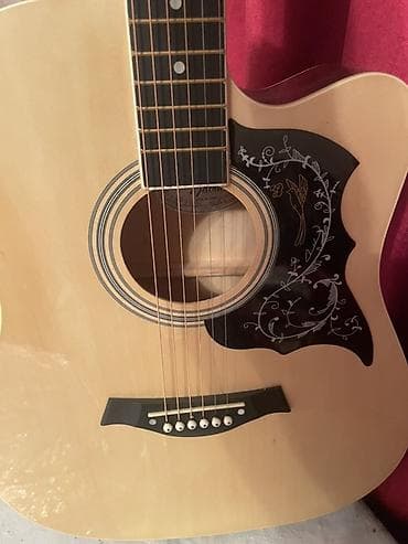 суб борд: Акустическая гитара dreadnought с вырезом (cutaway). - Корпус формата — 9