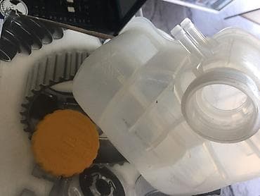 Запчасти на Опель. Расширительные бачки,крышки расширителя на все