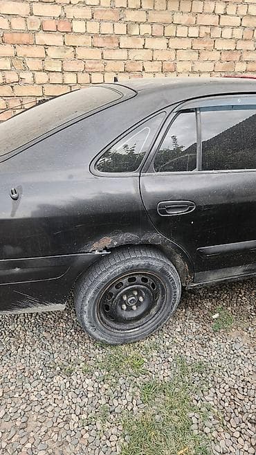 спидометра: Mazda 626: 2001 г., Механика, Седан — 4