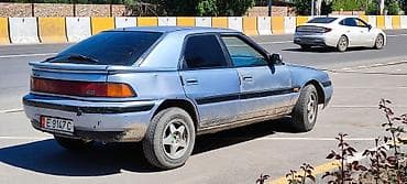 е 211: Mazda 323: 1994 г., 1.6 л, Ручные, Бензин, Хэтчбэк — 7