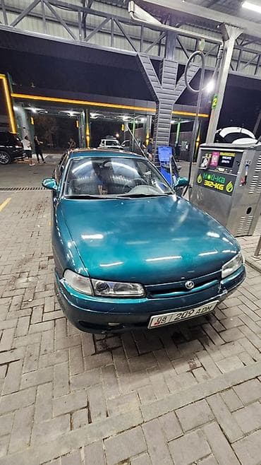 Продажа авто: Mazda 626: 1993 г., 2 л, Механика, Бензин, Хэтчбэк — 1