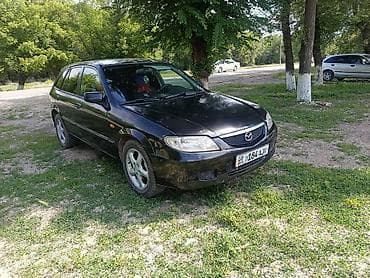 моторчик печки 124: Mazda 323: 2001 г., 2 л, Механика, Бензин, Хэтчбэк — 3