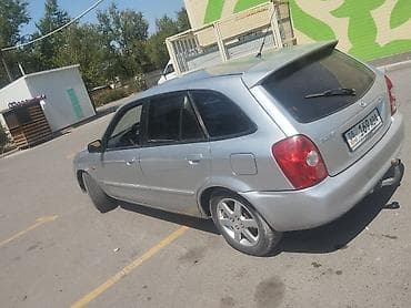 буксир: Mazda 323: 2003 г., Механика, Бензин, Универсал — 9