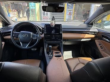 тайота арио: Toyota Avalon: 2021 г., 2.5 л, Автомат, Гибрид, Седан — 7