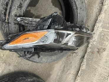 вента фары: Передняя левая фара Toyota — 1