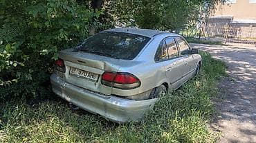 на мазду: Mazda 626: 1999 г., 2 л, Механика, Бензин, Седан — 4