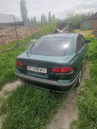 Mazda 626: 2000 г., 0.2 - engine capacity л, Кол менен иштөөчү, Бензин, Хетчбек — 3