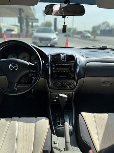 e star: Mazda 323: 2003 г., 1.6 л, Автомат, Бензин, Хэтчбэк — 6