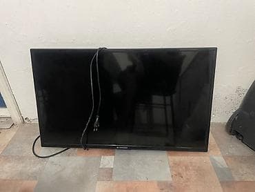 ТВ и видео: Телевизор BRANDSON, диагональ около 32–40". Плоская LED‑панель с — 1