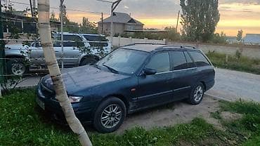 Mazda 626: 1999 г., Механика, Бензин, Универсал