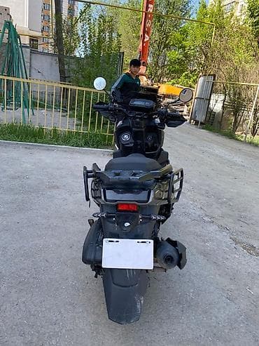 can bus: Скутер/максискутер с двойной круглой оптикой и защитным обвесом — 1