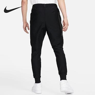 штаны мурской: Мужские спортивные штаны Nike (черные) - Прямой крой с зауженными — 1