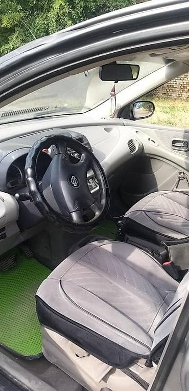 несс: Nissan Tino: 2000 г., 2 л, Автомат, Бензин, Минивэн — 4