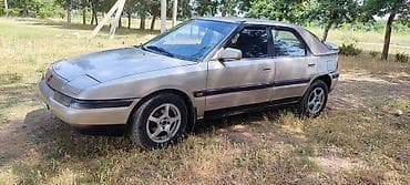 vt 1300: Mazda 323: 1991 г., 1.8 л, Механика, Бензин, Хэтчбэк — 7