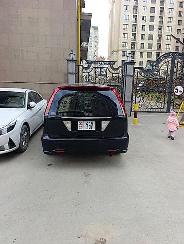 mini v: Honda Stream: 2003 г., 2 л, Автомат, Бензин, Минивэн — 1