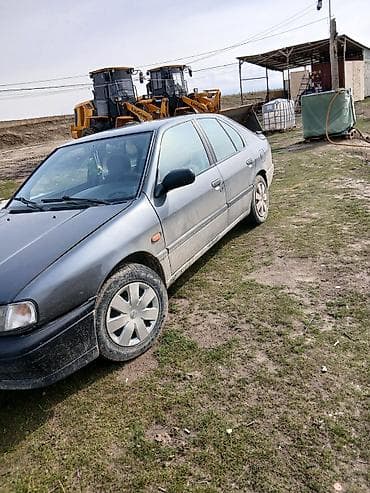Транспорт: Nissan Primera: 1995 г., 0.2 л, Седан — 2