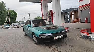 Транспорт: Mazda Cronos: 1996 г., 1.8 л, Кол менен иштөөчү, Бензин, Хетчбек — 2