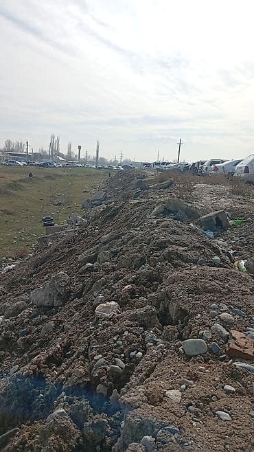 Отсыпка/насыпь: грунт с примесью щебня и строительных фрагментов -