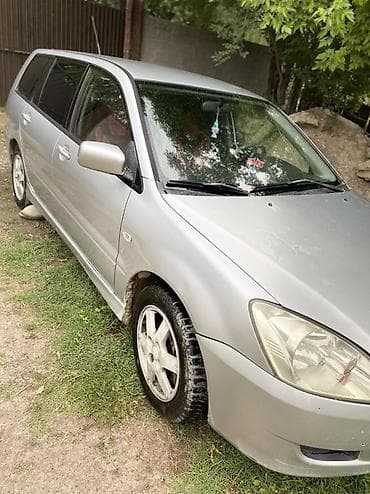 мтз 9: Mitsubishi Lancer: 2003 г., 1.6 л, Механика, Газ, Универсал — 4