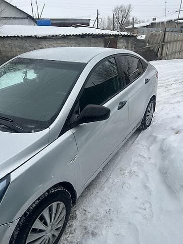 ej 205: Hyundai Solaris: 2015 г., Механика, Седан — 1
